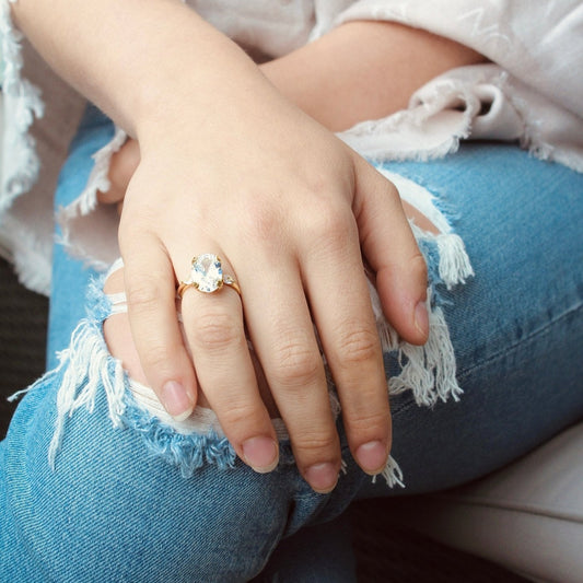 Ophelia oval cut gold plated engagement promise ring on model - Regal Gems Jewellery